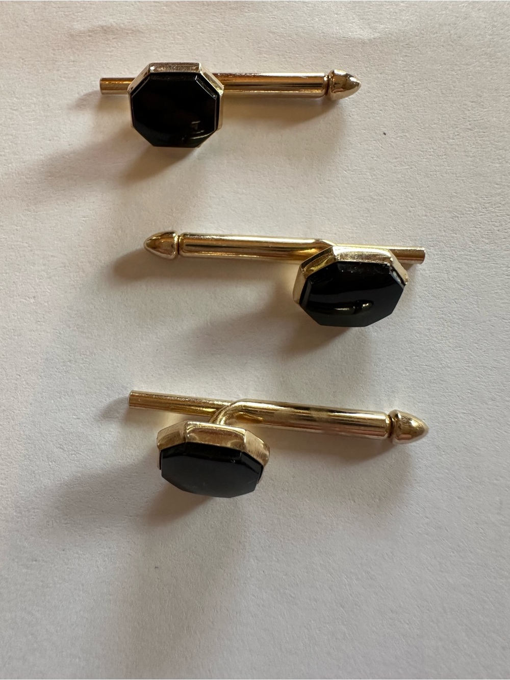 Vintage gold and black tuxedo studs by Swank.